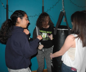 Youth let off some steam at the teen center’s punching bag.